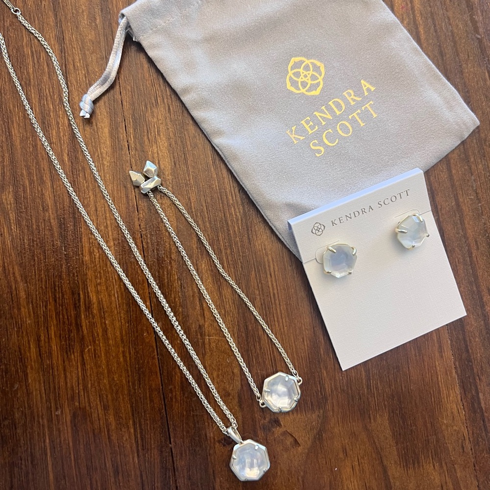 Kenda Scott 3 piece set in gold with ivory mother of pearl stone.